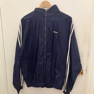Vintage blue adidas windbreaker size large.
